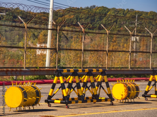 Barricades line the Bridge of Freedom on the approach to the the DMZ between North and South Korea; Paju, Republic of Korea photo