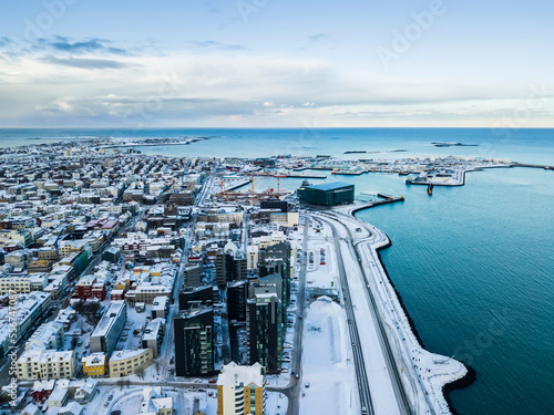 Views over the city centre of Reykjavik. The famed Harpa opera house sits on the edge of the ocean port; Reykjavik, Iceland photo