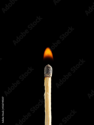 Burning matches closeup isolated on a black