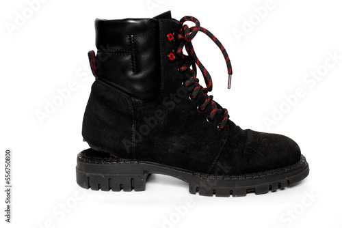 Boot with the sole torn off on a white background photo