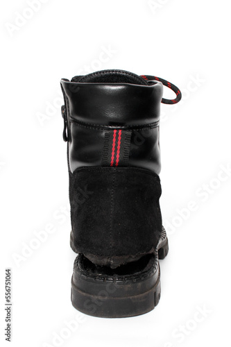Boot with the sole torn off on a white background