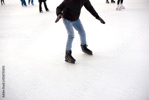 People ice skating.