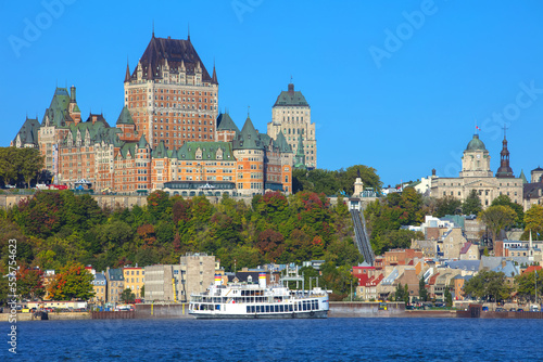 Quebec City skyline and Chateau Frontenac with a ferry on the Saint Lawrence River; Quebec City, Quebec, Canada photo