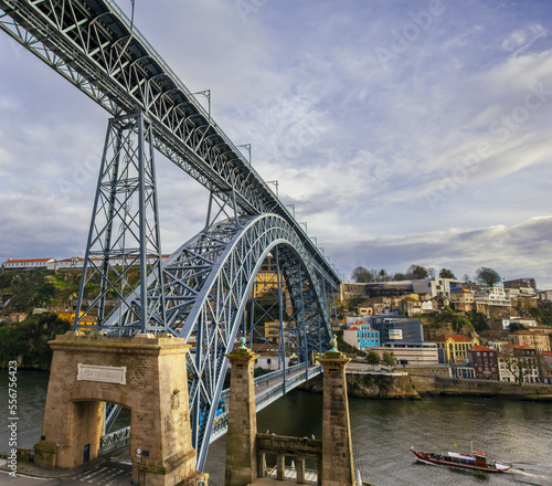 Dom Luis I Bridge spanning the River Douro between the cities of Porto and Vila Nova de Gaia, looking towards the riverbank waterfront of Vila Nova de Gaia; Porto, Norte Region, Portugal photo