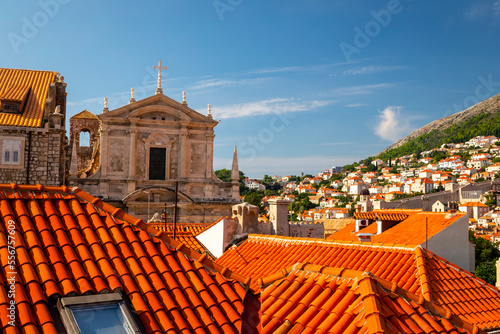 Tiled rooftops, Church of St Ignatius and whitewashed houses on the hillside of Dubrovnik, Croatia, photo