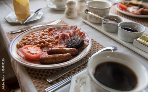 The Full Irish Breakfast served at a Bed and Breakfast table with coffee and scones; Cong, County Mayo, Ireland photo