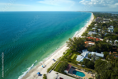 Aerial view of expensive residential houses in island small town Boca Grande on Gasparilla Island in southwest Florida. American dream homes as example of real estate development in US suburbs © bilanol