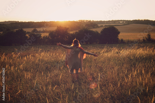 Photography woman in the sunset