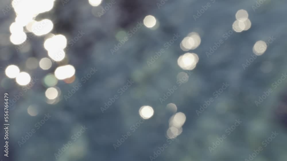 bokeh on sunny water blur blue colorful background