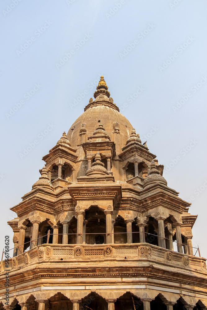 Low angle view of stone Chyasi Deval Krishna hindu temple on Patan Durbar Square in a sunny day in Lalitpur city, Nepal. Clear blue sky. Religious architecture. Travel in Asia theme.