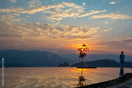 Prakriti Shakti Naturopathy Retreat with infinity pool at dawn; Kochi, Kerala, India photo