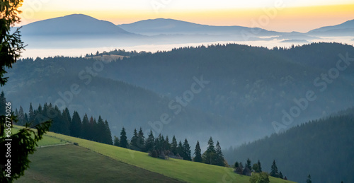 Dawn over the silhouetted Carpathian Mountains, Tasuleasa Social, Transylvania, Romania, photo
