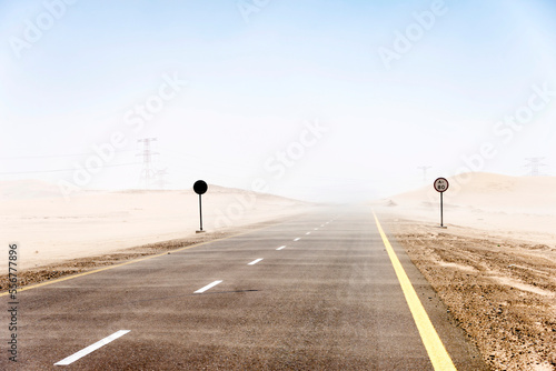 A sandstorm blows across the highway outside of Abu Dhabi City, UAE; Abu Dhabi, United Arab Emirates photo