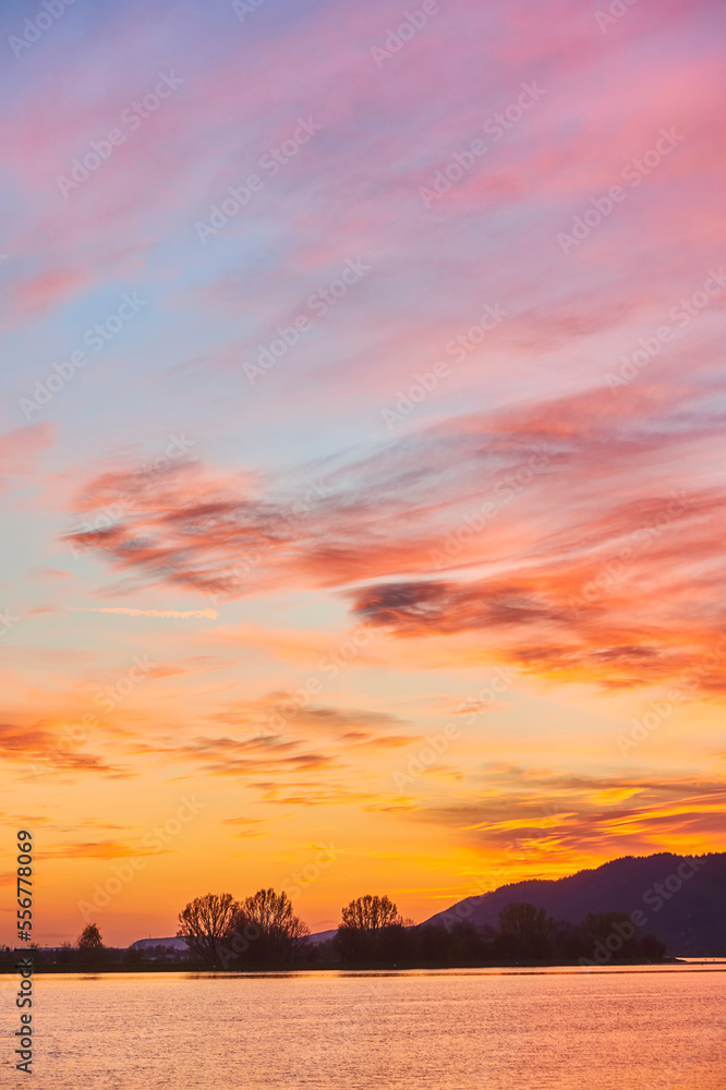 Vibrant sunset above Danubia River, Upper Palatinate, Bavarian Forest; Bavaria, Germany