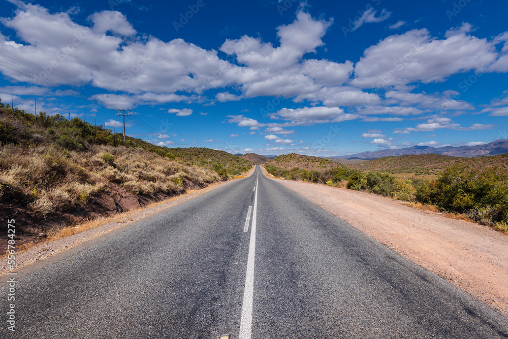 Straight paved two-lane road leading into the distance, Route 62 in South Africa; South Africa Straight paved two-lane road leading into the distance, Route 62 in South Africa; South Africa
