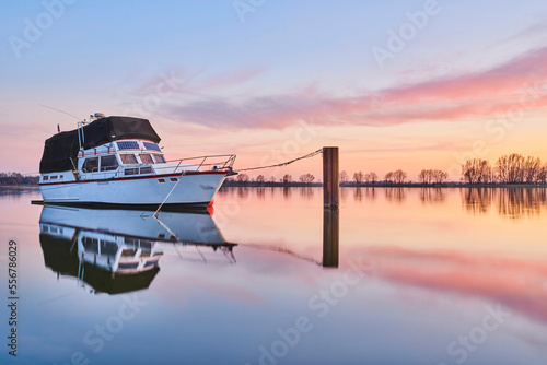A boat moored on Donau River at sunset; Upper Palatinate, Bavaria, Germany