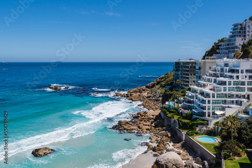 Beachfront buildings along the Atlantic Ocean at Clifton Beach; Cape Town, Western Cape, South Africa photo