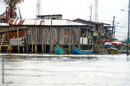 Boats moored in front of wooden houses in La Tola  Ecuador