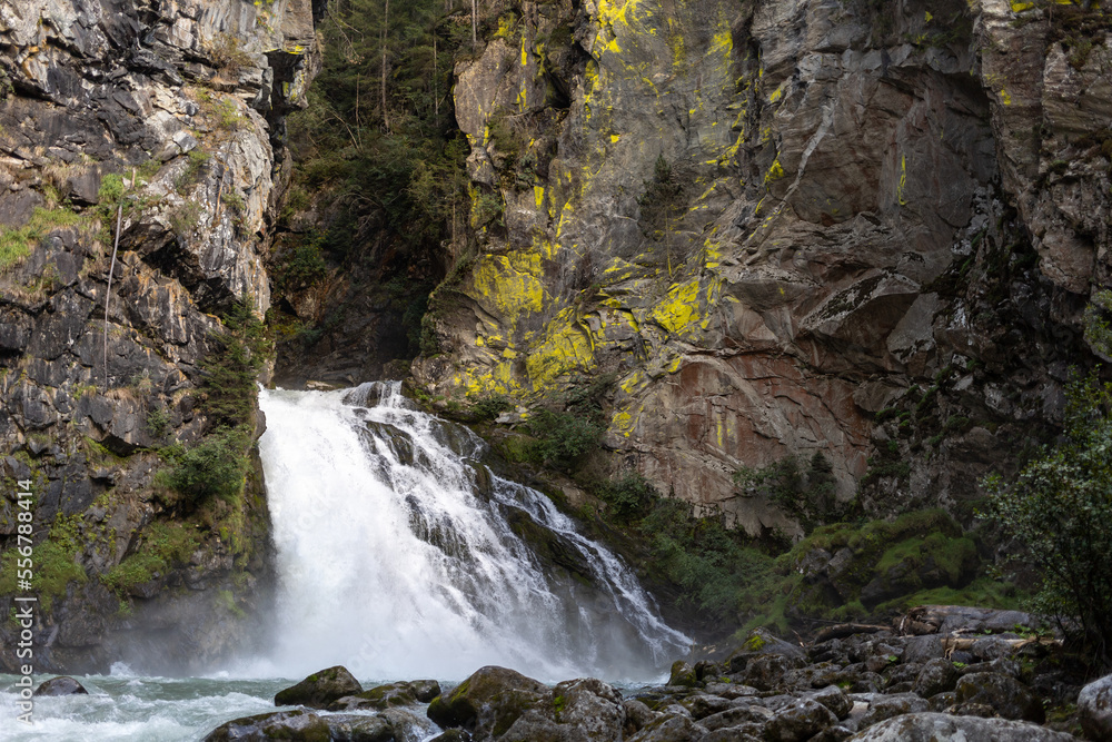 waterfall between old rocks beautiful nature background waterfall between old rocks beautiful nature background