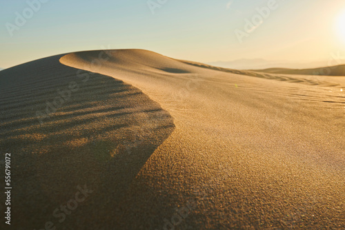 Rippled sand dunes in sunset light, Ebro River Delta; Catalonia, Spain photo