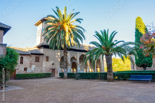 Walking in green gardens of Alhambra in Granada, Spain on November 26, 2022
