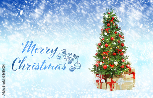 Merry Christmas. Beautiful decorated Christmas tree on light blue background, bokeh effect