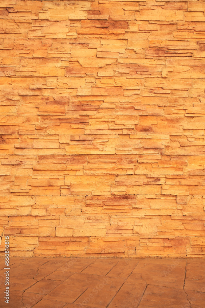 Obraz premium Beautiful textured stone wall and sidewalk outdoors