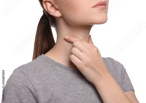 Woman with sore throat on white background, closeup