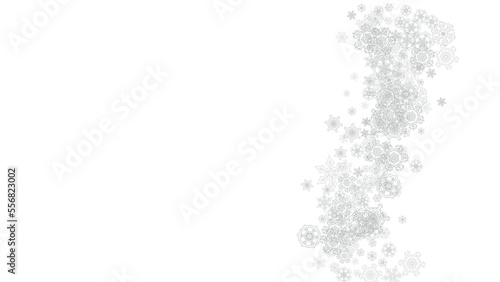 Snowflakes falling on white background. Horizontal Christmas and Happy New Year theme. Silver falling snowflakes for banner, gift card, party invitation, partner compliment and special business offers