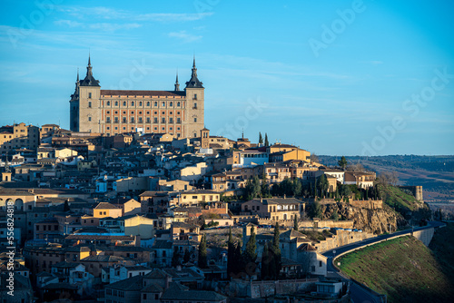 Views of the city of Toledo and its Alcazar, civil and military fortification, during sunrise on a clear and sunny day