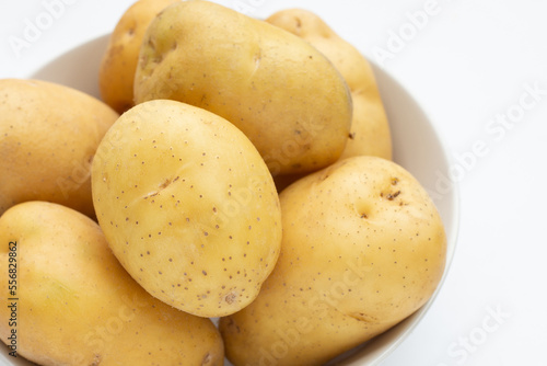 Raw potatoes isolated on white background