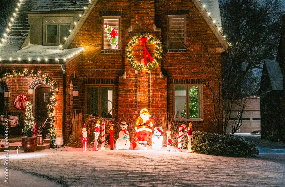 A house decorated for Christmas in a middle class neighborhood.