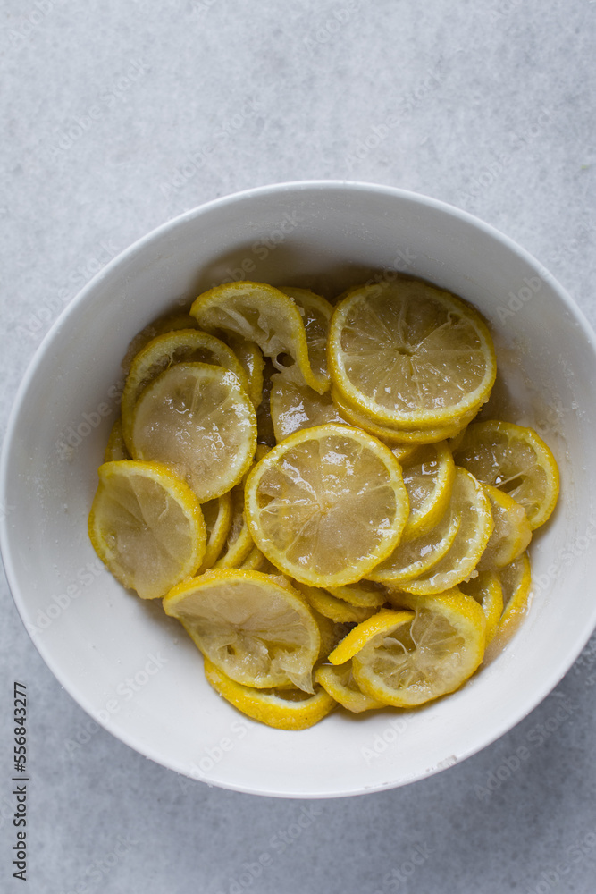 sugar and lemon slices, making lemon syrup, sugar preserved lemons sugar and lemon slices, making lemon syrup, sugar preserved lemons