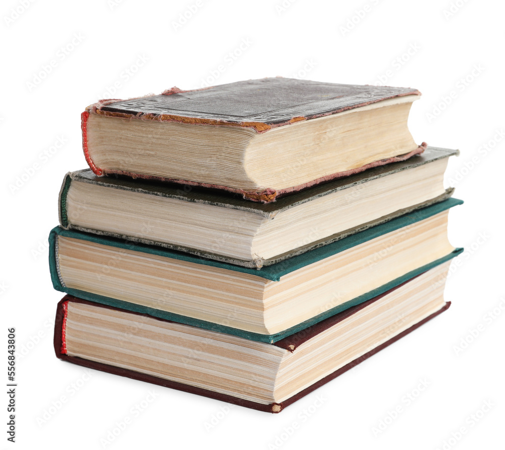 Stack of many old hardcover books isolated on white Stack of many old hardcover books isolated on white