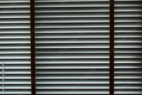 white blinds curtain put on the window, interior design