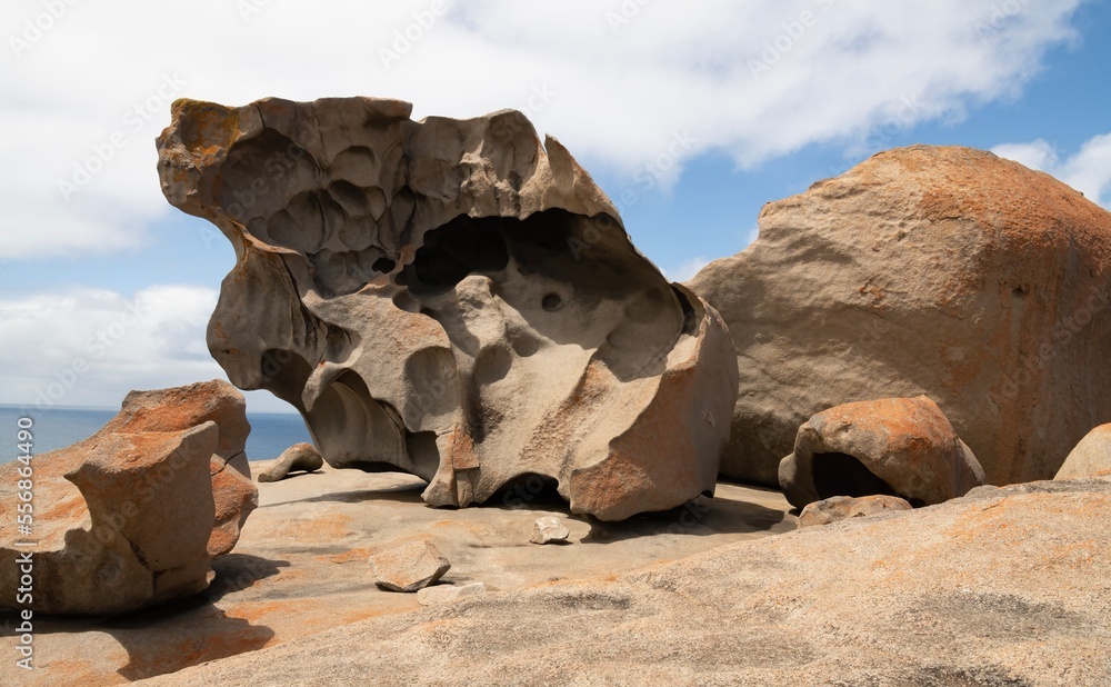 Remarkable Rocks in Flinders Chase National Park on Kangaroo Island, South Australia. Rocks covered by golden orange lichen. Black mica, bluish quartz and pinkish feldspar comprise most of the granite