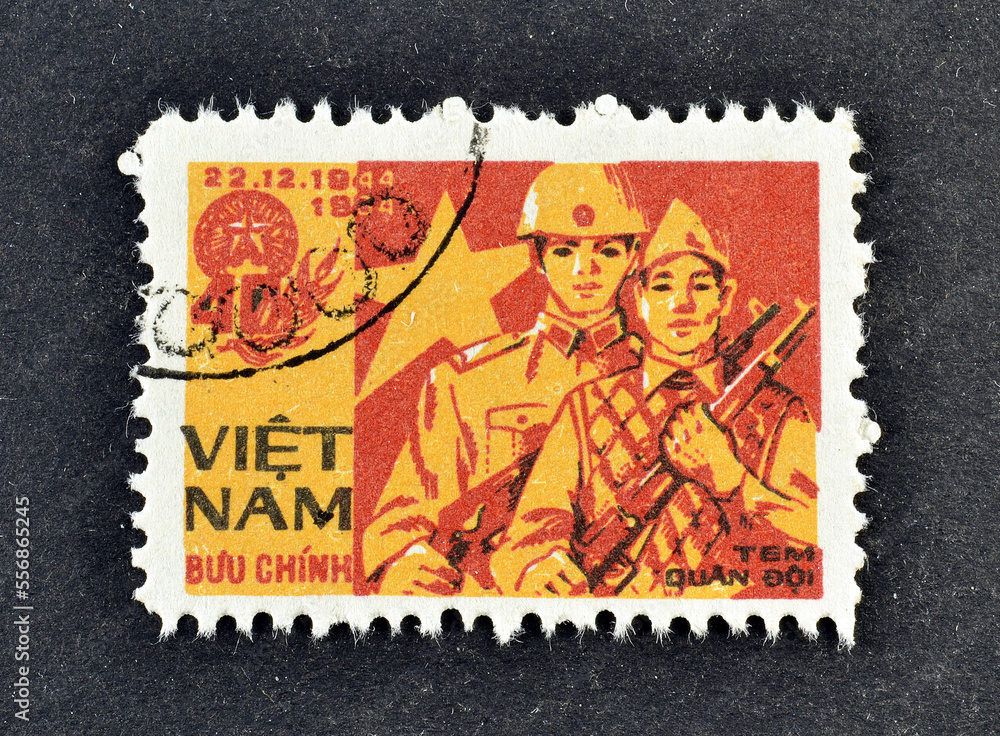 Cancelled postage stamp printed by Vietnam, that shows Vietnamese army
