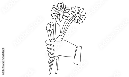 Continuous line of hand holding flower