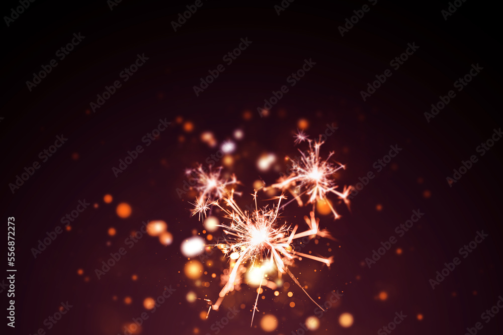 Red fireworks on black background with bokeh background