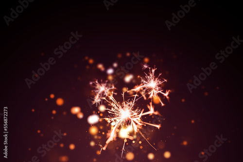 Red fireworks on black background with bokeh background