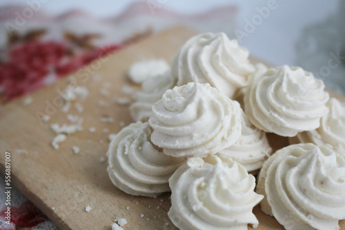Kue Sagu Keju or Cheese Sago Cookies Served on Wooden Board in White Background