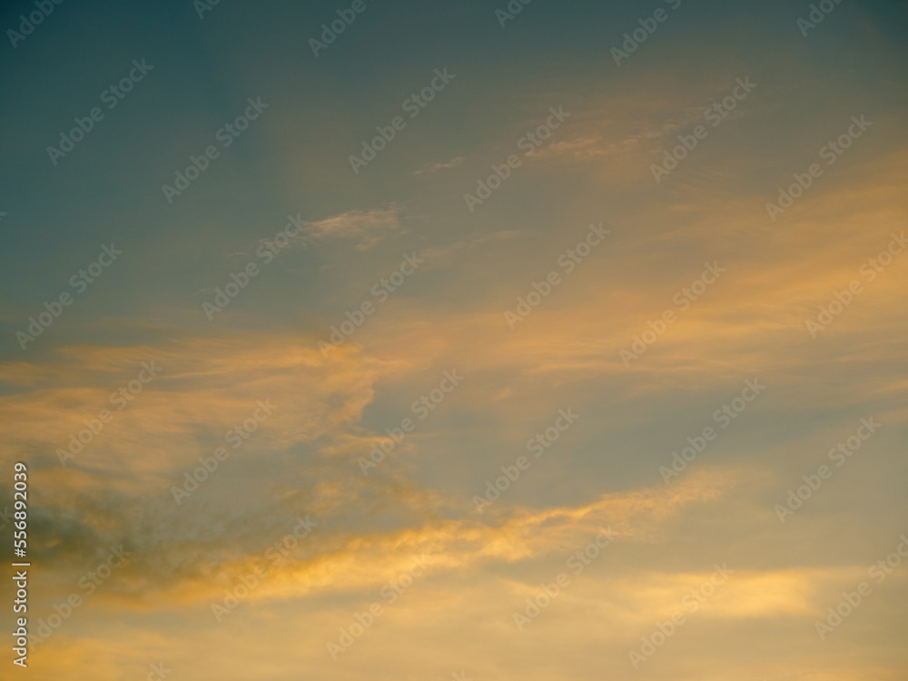 Yellow soft clouds against the evening sky Yellow soft clouds against the evening sky