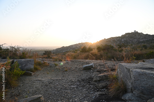 Soft dramatic blue-orange sky in the evening during sunset. Sunset view with hills landscape.