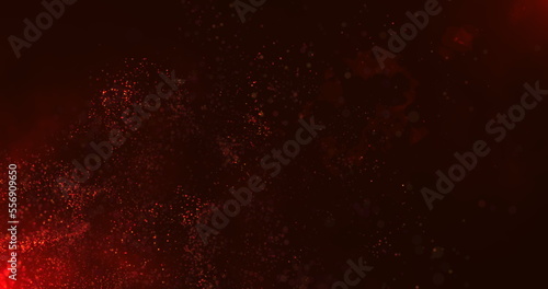 A vortex of red particles slowly unfolding in the wind against a dark red background. Bokeh particles. Sparks from the fire in the light of the flames. 3D render.