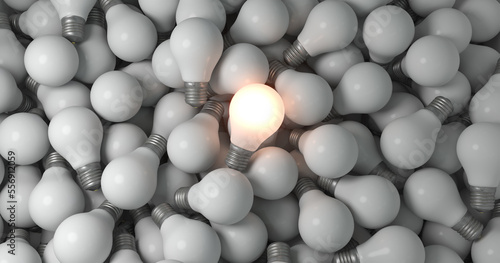 Glowing bulb among the gray unlit bulbs.Unique ideas, 3d render 