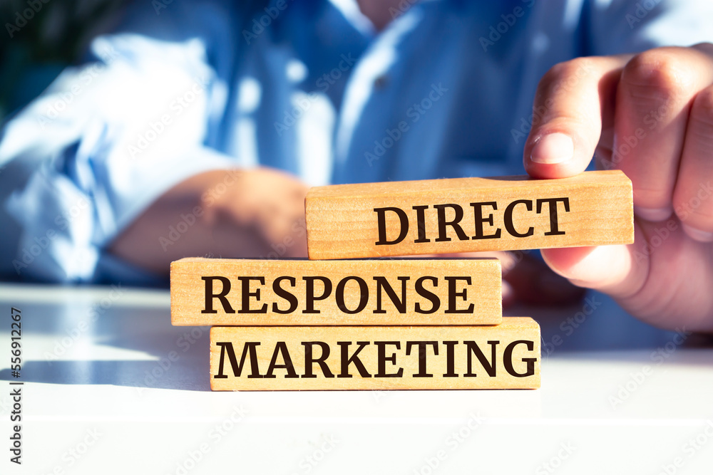 Wooden blocks with words 'DIRECT RESPONSE MARKETING'. Business concept Wooden blocks with words 'DIRECT RESPONSE MARKETING'. Business concept