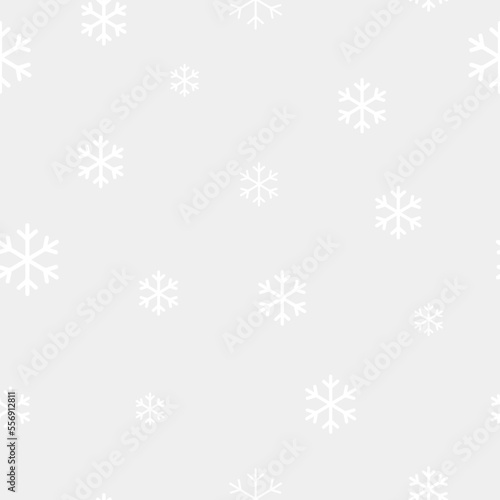 Simple Christmas seamless pattern. Snowflakes on a light background