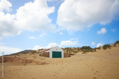 House in sand on beach in Porto Santo, island near Madeira, Portugal.