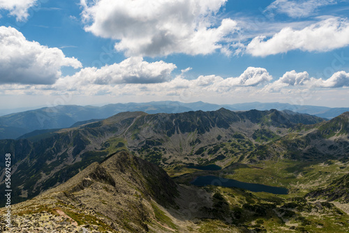 View from Pelaaga mountain peak - higjhest hill of Retezat mountains in Romania