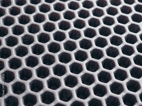 black  rubber mat as honeycomb background